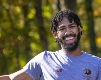 Man sitting outside smiling
