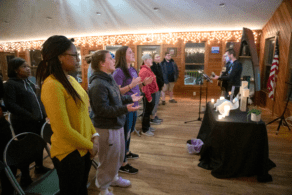 students standing and singing