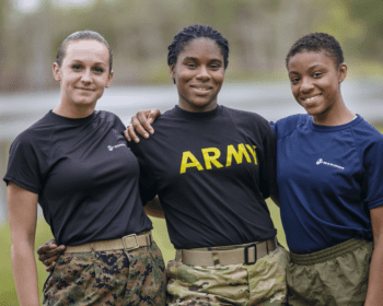 Three students in ROTC smiling