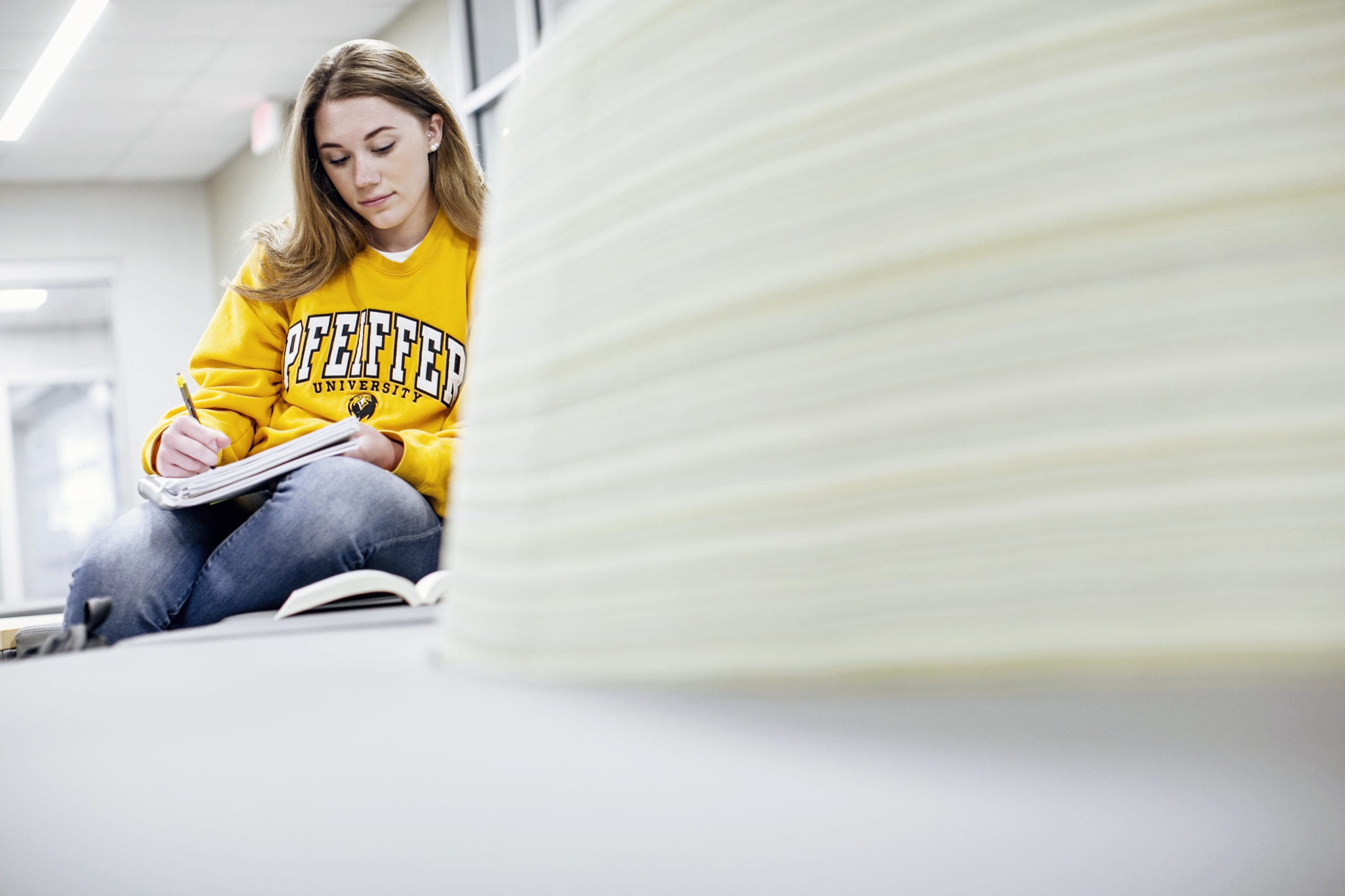 Student sitting down while studying
