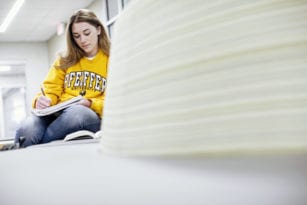 Student sitting down while studying