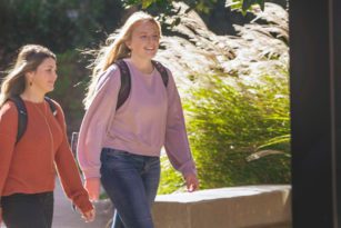 Two students walking outside on Pfeiffer's campus
