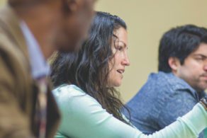 Student pointing and talking in class