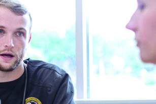 Two students talking to each other