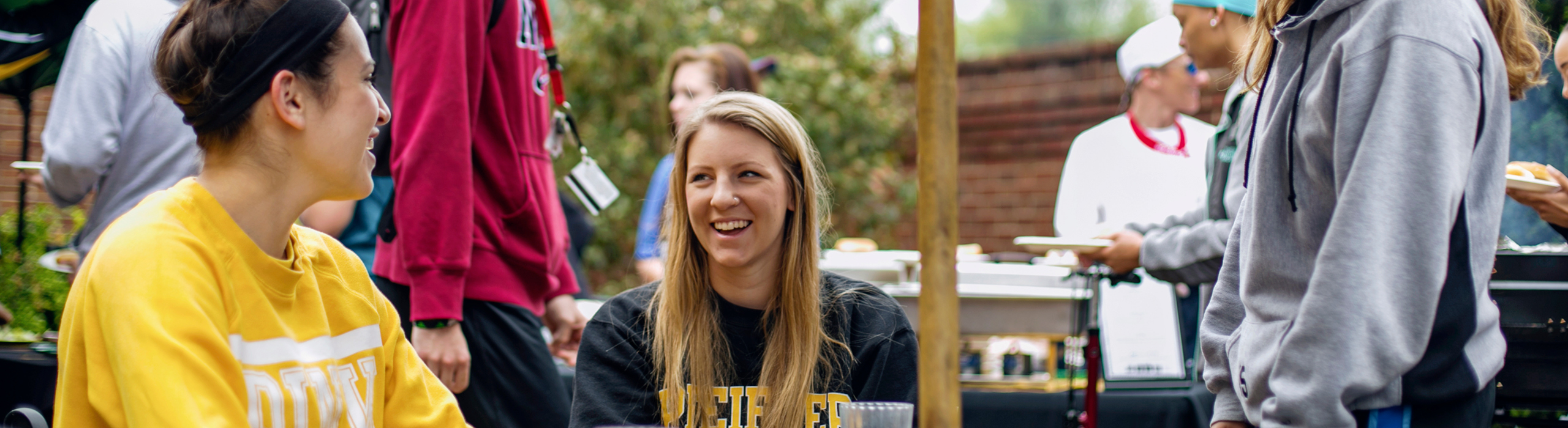 Students at outdoor cookout